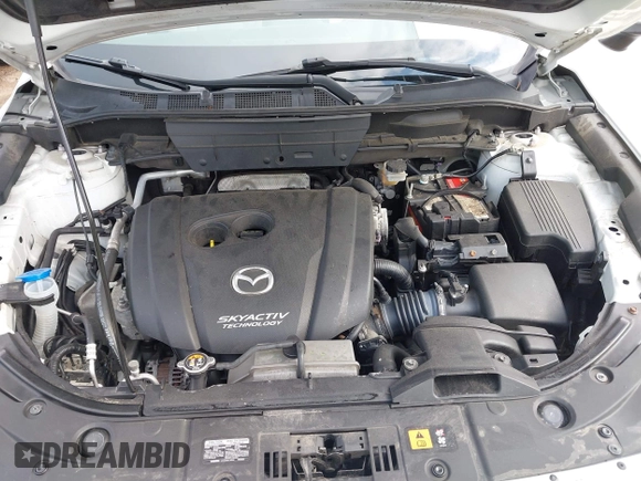 2018 Mazda CX-5 Grand Touring with VIN JM3KFBDM0J0308813, listed as a IAAI auction lot 42657978 with 78,119 mi miles and . Bid and sale history available at DreamBid. Image 10.