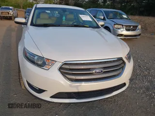 2015 Ford Taurus SEL with VIN 1FAHP2E82FG202143, listed as a IAAI auction lot 42053737 with 113,839 mi miles and . Bid and sale history available at carsss.com. Image 12.