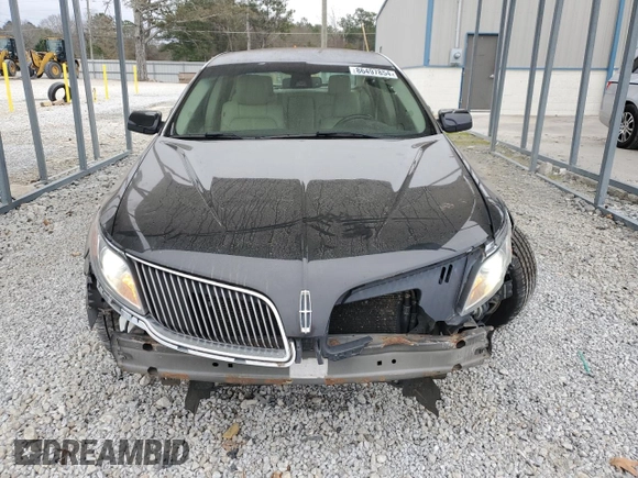 2014 Lincoln MKS EcoBoost z VIN 1LNHL9FT5EG601141, wystawiony jako Copart lot #86497854 z przebiegiem 136 915 mil mil oraz Szkoda całkowita • Salvage title. Historia ofert i sprzedaży dostępna na DreamBid. Obrazek 5.