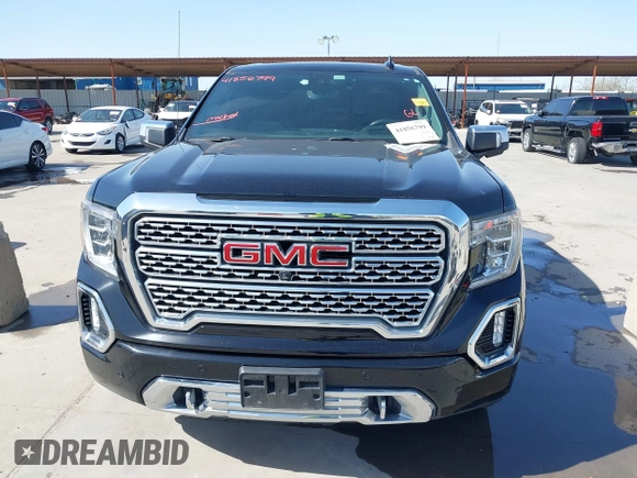 2020 GMC Sierra 1500 Denali with VIN 1GTU9FEL6LZ173499, listed as a IAAI auction lot 41856799 with 77,723 mi miles and . Bid and sale history available at DreamBid. Image 6.