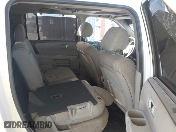 2015 Honda Pilot Touring with VIN 5FNYF3H98FB017564, listed as a IAAI auction lot 41587390 with 162,676 mi miles. Bid and sale history available at carsss.com. Image 8.