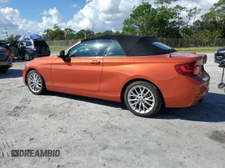 2016 BMW 2 Series 228i with VIN WBA1K9C50GV710942, listed as a Copart auction lot 77700934 with 28,643 mi miles and Salvage Title. Bid and sale history available at carsss.com. Image 2.