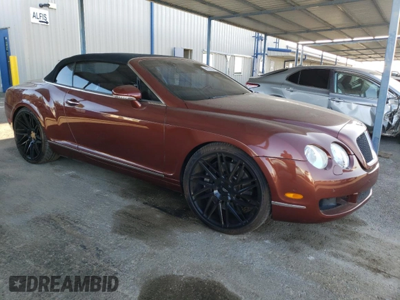 2007 Bentley Continental GT with VIN SCBDR33W77C047935, listed as a Copart auction lot 60557985 with 61,661 mi miles and Salvage title. Bid and sale history available at DreamBid. Image 4.