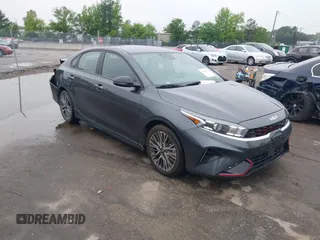 2023 Kia Forte GT-Line z VIN 3KPF54AD9PE532899, wystawiony jako IAAI lot #42216215 z przebiegiem 50 861 mil mil oraz . Historia ofert i sprzedaży dostępna na DreamBid. Obrazek 1.
