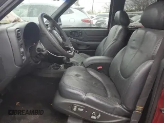1999 GMC Jimmy SLE with VIN 1GKDT13W3X2546163, listed as a Copart auction lot 79842734 with 144,800 mi miles and Salvage Title. Bid and sale history available at carsss.com. Image 7.