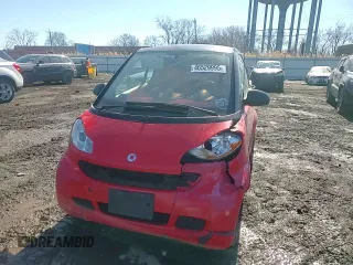 2009 Smart fortwo Pure z VIN WMEEJ31X79K274220, wystawiony jako Copart lot #46529995 z przebiegiem 76 185 mil mil oraz Szkoda całkowita • Salvage title. Historia ofert i sprzedaży dostępna na DreamBid. Obrazek 11.