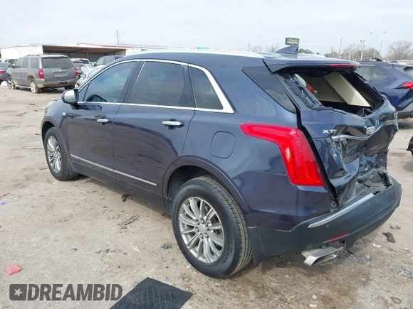 2018 Cadillac XT5 Luxury FWD with VIN 1GYKNCRS3JZ142575, listed as a IAAI auction lot 41546325 with 220,513 mi miles. Bid and sale history available at carsss.com. Image 3.