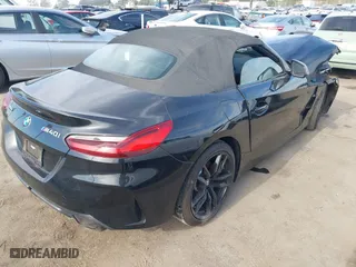 2022 BMW Z4 sDriveM40i with VIN WBAHF9C08NWX88691, listed as a IAAI auction lot 40983519 with 11,108 mi miles. Bid and sale history available at carsss.com. Image 4.