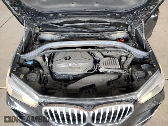 2021 BMW X1 sDrive28i z VIN WBXJG7C02M5S30154, wystawiony jako Copart lot #56076565 z przebiegiem 57 671 mil mil oraz Tytuł czysty. Historia ofert i sprzedaży dostępna na DreamBid. Obrazek 11.