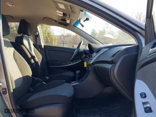 2014 Hyundai Accent GS with VIN KMHCT5AE6EU174338, listed as a IAAI auction lot 41096955 with 49,614 mi miles. Bid and sale history available at carsss.com. Image 5.