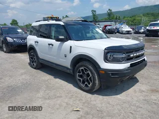 2021 Ford Bronco Sport Big Bend with VIN 3FMCR9B6XMRB31205, listed as a IAAI auction lot 42441656 with 77,420 mi miles and . Bid and sale history available at DreamBid. Image 1.