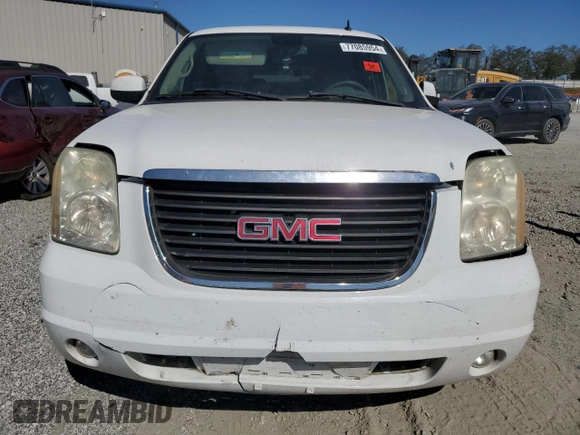 2007 GMC Yukon SLE with VIN 1GKFK13017J109923, listed as a Copart auction lot 77085954 with 214,986 mi miles and Salvage Title. Bid and sale history available at carsss.com. Image 5.