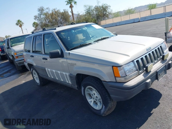 1994 Jeep Grand Cherokee Laredo with VIN 1J4GZ58S4RC325909, listed as a IAAI auction lot 39580601 with 162,952 mi miles. Bid and sale history available at carsss.com. Image 1.