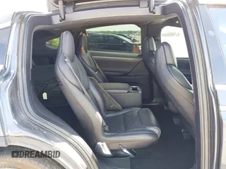 2017 Tesla Model X 90D with VIN 5YJXCBE22HF079194, listed as a IAAI auction lot 41895591 with 102,437 mi miles and . Bid and sale history available at DreamBid. Image 8.