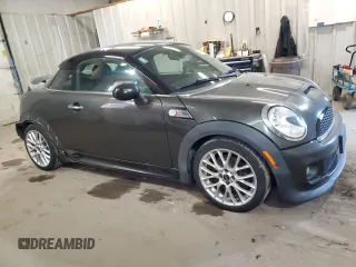 2012 MINI Coupe S z VIN WMWSX3C50CT154835, wystawiony jako Copart lot #76659984 z przebiegiem 122 425 mil mil oraz Szkody całkowita. Historia ofert i sprzedaży dostępna na DreamBid. Obrazek 4.