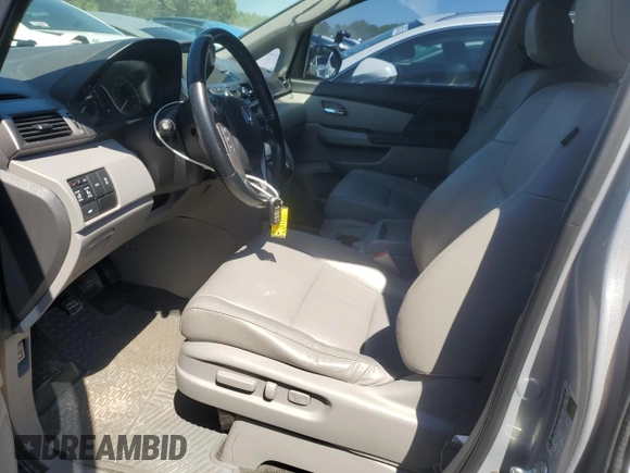 2015 Honda Odyssey EX-L with VIN 5FNRL5H66FB112090, listed as a Copart auction lot 52721475 with 120,472 mi miles and Salvage Title. Bid and sale history available at DreamBid. Image 7.