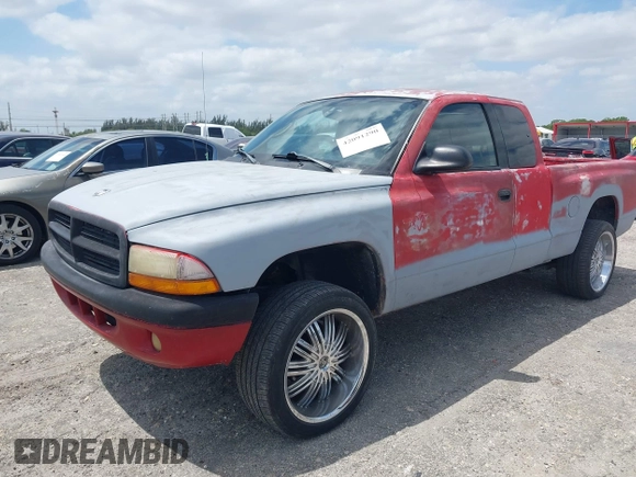 2002 Dodge Dakota Sport with VIN 1B7GL32X82S632091, listed as a IAAI auction lot 42091290 with 206,721 mi miles and . Bid and sale history available at carsss.com. Image 2.