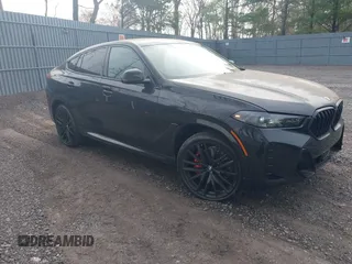 2025 BMW X6 xDrive40i with VIN 5UX33EX09S9Y89594, listed as a IAAI auction lot 42072438 with 460 mi miles. Bid and sale history available at carsss.com. Image 1.