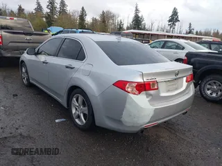 2012 Acura TSX Tech Pkg with VIN JH4CU2F62CC012290, listed as a IAAI auction lot 40765338 with 129,737 mi miles. Bid and sale history available at carsss.com. Image 3.