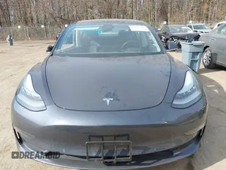 2018 Tesla Model 3 Long Range Battery with VIN 5YJ3E1EB5JF063077, listed as a IAAI auction lot 41773551 with 99,477 mi miles and . Bid and sale history available at DreamBid. Image 12.