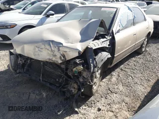 1999 Toyota Camry LE z VIN JT2BF28K5X0200853, wystawiony jako Copart lot #50666075 z przebiegiem Nie podano mil oraz Nie do naprawy • Non repairable. Historia ofert i sprzedaży dostępna na DreamBid. Obrazek 1.
