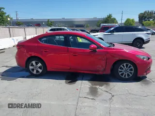 2014 Mazda 3 i Touring with VIN JM1BM1V75E1112948, listed as a IAAI auction lot 42184319 with 59,855 mi miles and . Bid and sale history available at DreamBid. Image 13.