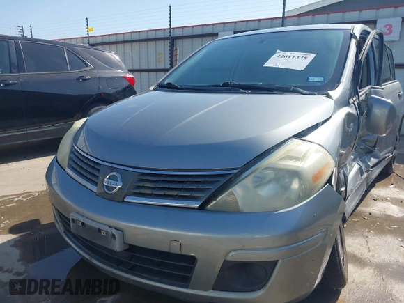 2009 Nissan Versa 1.8 SL with VIN 3N1BC13E19L372298, listed as a IAAI auction lot 42011338 with 131,882 mi miles. Bid and sale history available at carsss.com. Image 19.