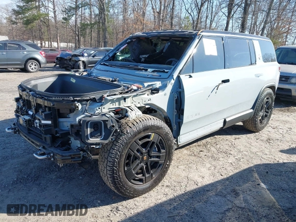 2024 Rivian R1S Adventure with VIN 7PDSGBBA8RN043516, listed as a IAAI auction lot 41675732 with 1 mi miles. Bid and sale history available at carsss.com. Image 2.