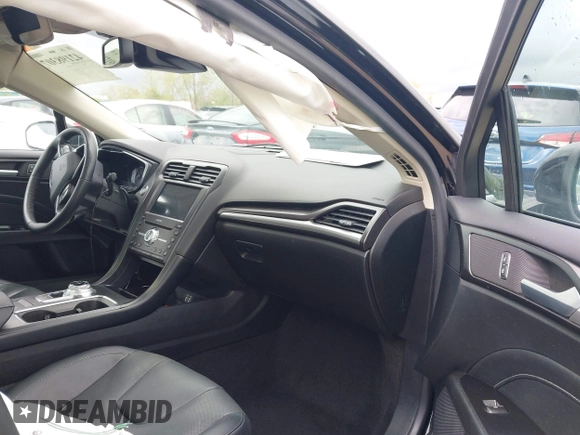 2019 Ford Fusion Titanium with VIN 3FA6P0K92KR248521, listed as a IAAI auction lot 42198307 with 51,844 mi miles and . Bid and sale history available at DreamBid. Image 5.