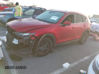 2020 Mazda CX-5 Touring z VIN JM3KFACM1L0855474, wystawiony jako IAAI lot #42004504 z przebiegiem 82 505 mil mil oraz . Historia ofert i sprzedaży dostępna na DreamBid. Obrazek 17.