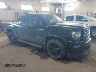 2018 GMC Sierra 1500 SLE z VIN 3GTU2MEC4JG395027, wystawiony jako IAAI lot #41527203 z przebiegiem 107 643 mil mil oraz . Historia ofert i sprzedaży dostępna na DreamBid. Obrazek 1.