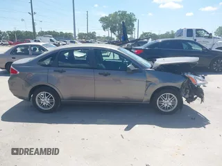 2009 Ford Focus SE with VIN 1FAHP35N99W147938, listed as a IAAI auction lot 41967707 with 48,254 mi miles and . Bid and sale history available at DreamBid. Image 14.