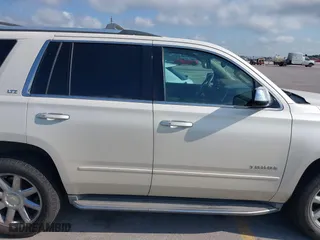 2015 Chevrolet Tahoe LTZ with VIN 1GNSCCKC4FR142856, listed as a IAAI auction lot 39886899 with 134,301 mi miles. Bid and sale history available at carsss.com. Image 13.
