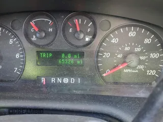 2006 Ford Taurus SE with VIN 1FAFP53U66A206014, listed as a IAAI auction lot 42045047 with 65,326 mi miles. Bid and sale history available at carsss.com. Image 7.