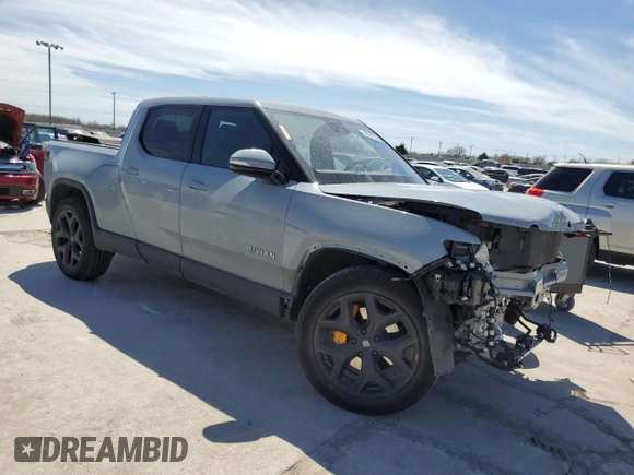 2022 Rivian R1T Adventure z VIN 7FCTGAAAXNN014983, wystawiony jako Copart lot #48987605 z przebiegiem Nie podano mil oraz Szkoda całkowita • Salvage title. Historia ofert i sprzedaży dostępna na DreamBid. Obrazek 4.