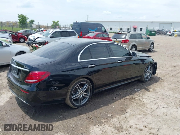 2018 Mercedes-Benz E with VIN WDDZF4KB2JA381699, listed as a IAAI auction lot 39407980 with 52,865 mi miles. Bid and sale history available at carsss.com. Image 4.