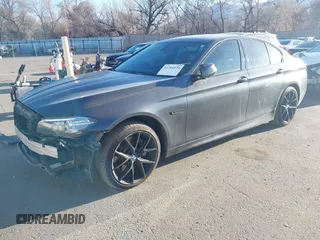 2015 BMW 5 Series 535i xDrive with VIN WBA5B3C58FD547704, listed as a IAAI auction lot 41764129 with 152,649 mi miles. Bid and sale history available at carsss.com. Image 2.