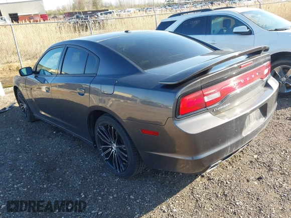 2013 Dodge Charger SXT with VIN 2C3CDXHG3DH593614, listed as a IAAI auction lot 42138282 with 174,243 mi miles. Bid and sale history available at carsss.com. Image 3.
