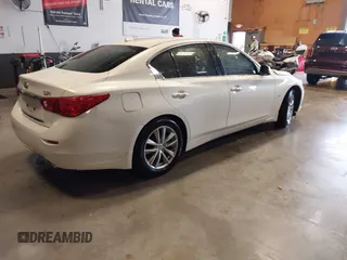 2014 Infiniti Q50 Premium z VIN JN1BV7AP0EM679026, wystawiony jako IAAI lot #42225108 z przebiegiem 96 656 mil mil oraz . Historia ofert i sprzedaży dostępna na DreamBid. Obrazek 4.