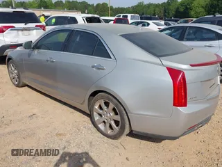 2013 Cadillac ATS Luxury z VIN 1G6AB5RA2D0117112, wystawiony jako IAAI lot #42288670 z przebiegiem 131 515 mil mil oraz . Historia ofert i sprzedaży dostępna na DreamBid. Obrazek 3.