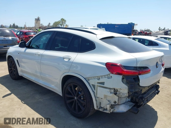 2021 BMW X4 xDrive30i with VIN 5UX2V1C07M9F78742, listed as a IAAI auction lot 42529383 with 40,786 mi miles and . Bid and sale history available at DreamBid. Image 3.
