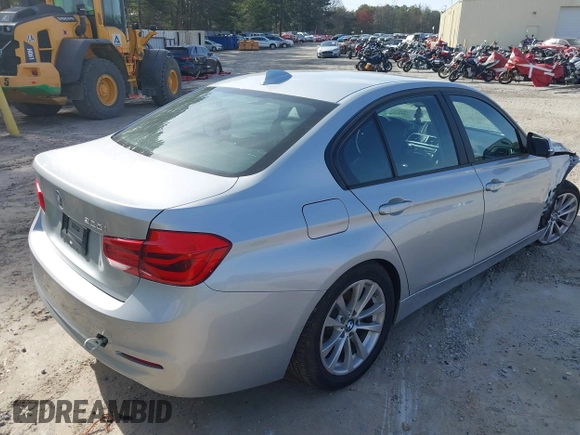 2018 BMW 3 Series 320i with VIN WBA8A9C55JAH14990, listed as a IAAI auction lot 41719896 with 77,472 mi miles. Bid and sale history available at carsss.com. Image 4.