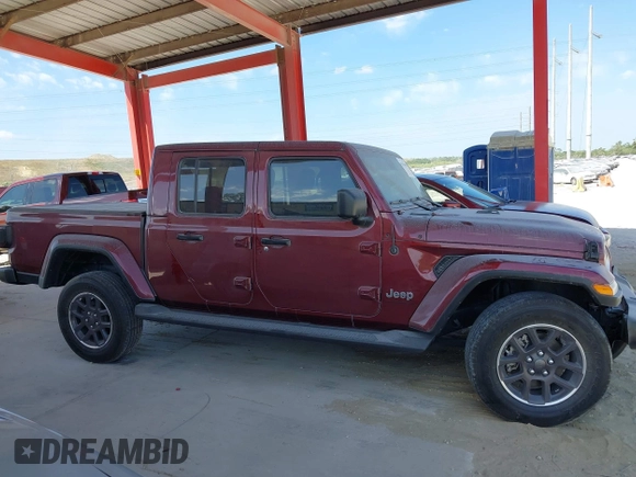 2021 Jeep Gladiator Overland z VIN 1C6HJTFGXML553983, wystawiony jako IAAI lot #41903068 z przebiegiem 54 386 mil mil oraz . Historia ofert i sprzedaży dostępna na DreamBid. Obrazek 13.
