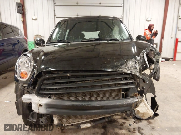 2012 MINI Countryman with VIN WMWZB3C53CWM05133, listed as a IAAI auction lot 41493309 with 114,412 mi miles and . Bid and sale history available at DreamBid. Image 13.