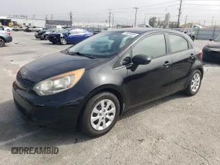 2014 Kia Rio LX with VIN KNADM5A35E6409088, listed as a Copart auction lot 75004804 with 111,664 mi miles and Salvage Title. Bid and sale history available at carsss.com. Image 1.