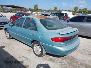 1998 Ford Escort LX with VIN 1FALP13P9WW103307, listed as a IAAI auction lot 40681877 with 1 mi miles. Bid and sale history available at carsss.com. Image 3.