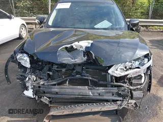 2018 Nissan Rogue SV with VIN KNMAT2MTXJP610718, listed as a IAAI auction lot 42006433 with 158,087 mi miles and . Bid and sale history available at DreamBid. Image 6.
