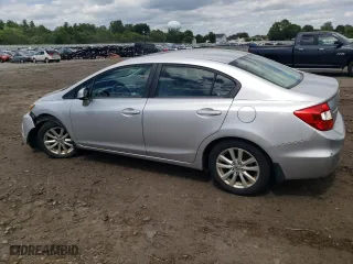 2012 Honda Civic Sdn EX-L with VIN 19XFB2F97CE013880, listed as a Copart auction lot 59819494 with 222,678 mi miles and Salvage Title. Bid and sale history available at carsss.com. Image 2.