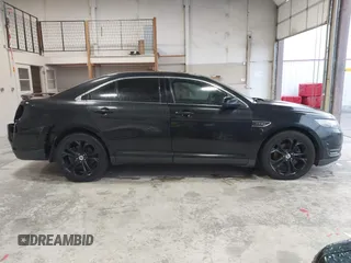 2013 Ford Taurus SHO с VIN 1FAHP2KT8DG159577, выставлен на аукционе IAAI как лот 41107630 с пробегом 90 865 миль миль и . История ставок и продаж доступна на DreamBid. Изображение 14.