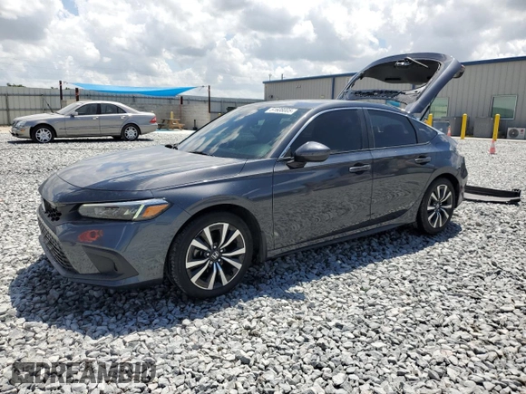 2023 Honda Civic EX-L z VIN 19XFL1H72PE010913, wystawiony jako Copart lot #51608005 z przebiegiem 35 961 mil mil oraz Szkoda całkowita • Salvage title. Historia ofert i sprzedaży dostępna na DreamBid. Obrazek 1.